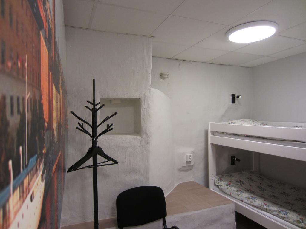 Cama en habitación compartida de 6 camas